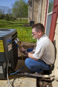 technician-checking-on-ac-pressure